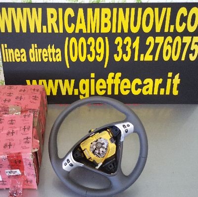 Volante pelle traforata con - volante,