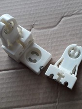 Coppia portalampade Neon. Confezione scatola 35 coppie.€ 0,80 a coppia.