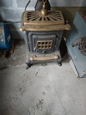 stufa a legna in ghisa usata