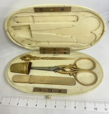 Necessaire antico oro 18k con