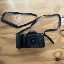 Olympus OM-88 fotocamera reflex pellicola 35 mm con obiettivo Olympus AF 50 mm Giappone non completamente testata