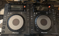 A pair of Pioneer CDJ900nexus