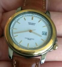 orologio vintage Orient japan 5 bar ghiera dorata corona al 4 funzionante quartz