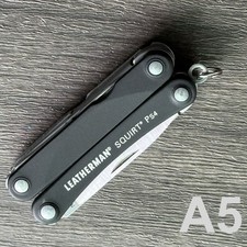 Portachiavi multitool Leatherman Squirt PS4 nero. Nuovo con imperfezioni cosmetiche