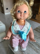 bambola anni 80,  automatica in grado di camminare h40. Cm