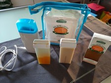 Kit depilazione Naturaverde con 3 cera a rullo, scaldacera e pochette