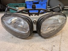 Supporto supporto supporto faro Triumph Sprint ST 955 1999-2004 955i e faro #W