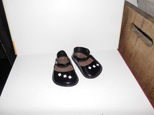 Vecchia bambola scarpe vernice