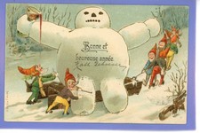 OLD VINTAGE 1913 EMBOSSED POSTCARD ELFS IMPS PULLING SNOWMAN  ON SLEDGE NEW YEAR
