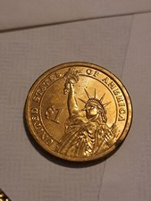 Moneta da un dollaro d'oro