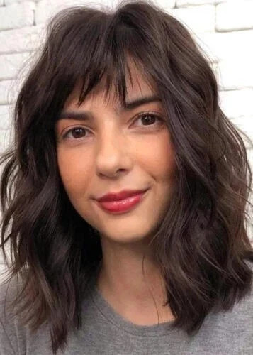Parrucche ondulate capelli