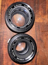 (2) Olympus OM 50mm Lenses