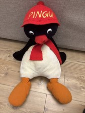 Peluche e cappello pinguino