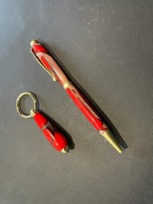 Penna Twist Gold e portachiavi