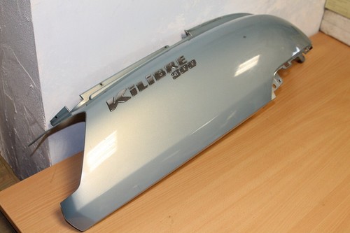 Cache lateral flan selle - lateral, de