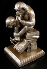 Statuina scimmia con teschio -