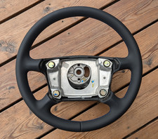 NEW LEATHER STEERING WHEEL FOR