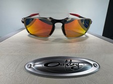 Occhiali da sole Oakley X-Metal stile Badman polarizzati montatura sliver lenti fuoco