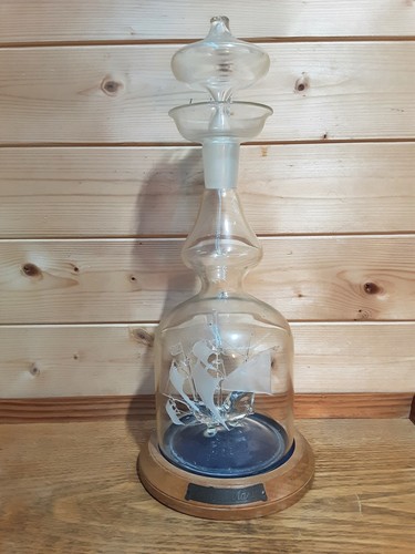 Vintage ship bottle on - ship, a