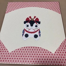 Cartolina gatto nastro rosso e