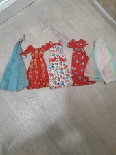 Barbie vintage 3 maxi abiti e 2 abiti/scarpe. Ottime condizioni.