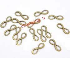 10pz ciondoli  connettori INFINITO 23x8mm colore bronzo