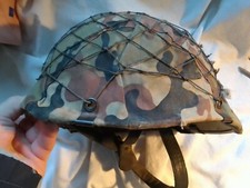 UN ELMETTO ...DA IDENTIFICARE !!  ( TEDESCO ? AMERICANO ?? ... )