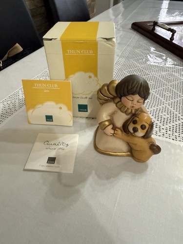 Angelo con cucciolo - cucciolo, thun