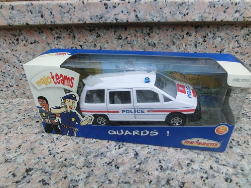 Majorette guards police car - majorette,