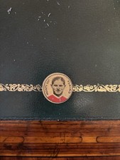 Figurina gettone metallico