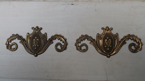 Coppia fregi in ottone - in,