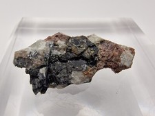 Cristallo loellinite con - di,