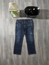 Jeans con doppio bottone e