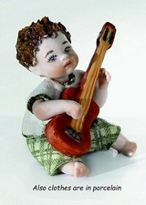 Statuina Bambino musicista Figura in Porcellana Capodimonte bimbo con chitarra