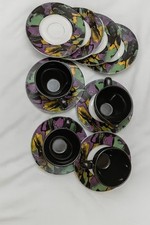 Set da tè vintage in ceramica, composto da 4 tazze nere lucide e piattini decor.