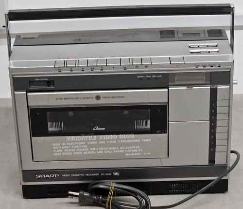 Sharp video cassette recorder - video,