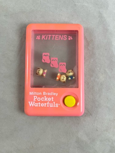 Milton bradley tomy pocket - tomy,