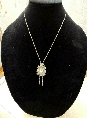 Collana con ciondolo - , orologio
