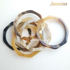 Set di 7 braccialetti corno di