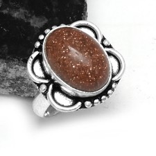 Anello etnico fatto - a, con