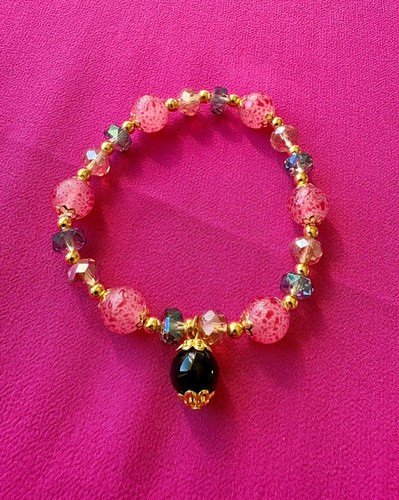 Braccialetto dorato con perle