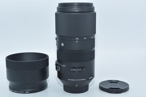 Sigma 100 400 - mm, dg