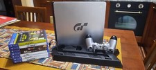 ps4 slim usata. 1 joypad + supporto verticale + n.7 giochi