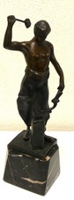 Bronzo vero fabbro con pezzo - vero,