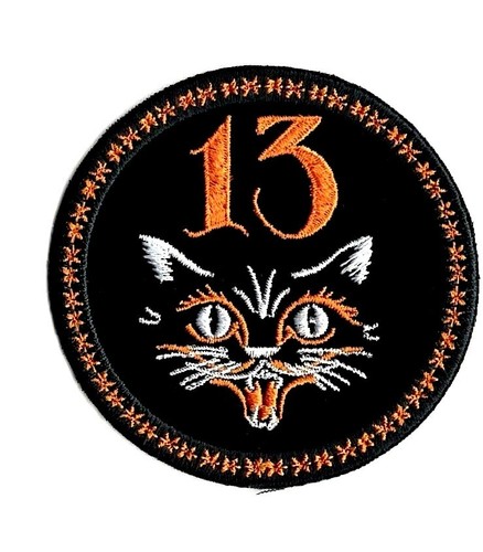 Toppa gatto nero numero - , 13