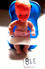 BAMBOLOTTO CON SEGGIOLINO  IN PLASTICA  ANNI 1970 - 80  ALTEZZA  MM.  140  (84E)