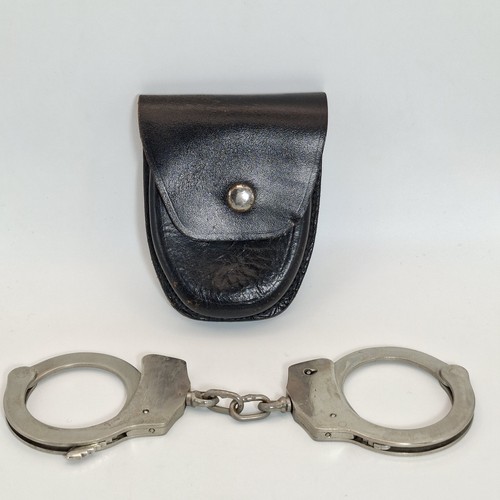 Vintage armed forces handcuffs - armed,