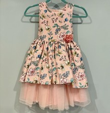 Abito smanicato rosa floreale