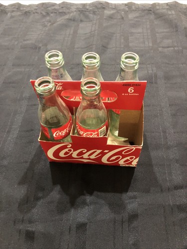 Five coca cola bottles - coca-cola, in