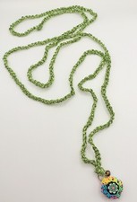 Collana chiama angeli in lurex verde + ciondolo IBISCUS. Uncinetto boho chic.